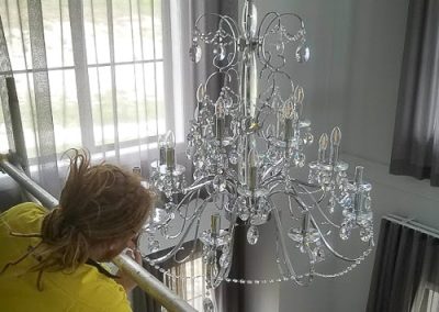 Daniel- Dressing a chandelier installed by Melba Electrical Services